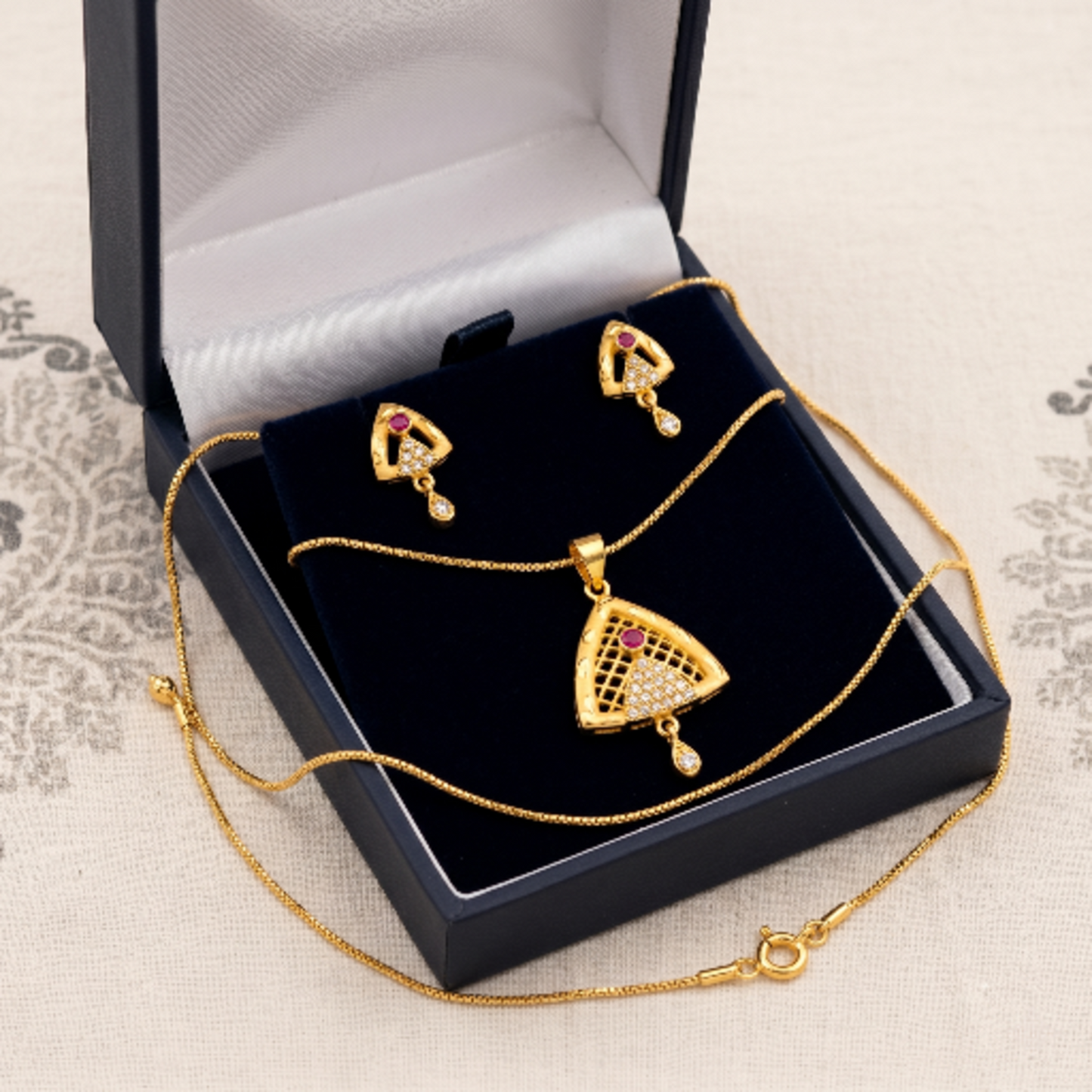 Premium Gold-Plated Triangular Pendant Necklace and Earrings Set for Women - Ethnic Traditional Jewellery with Ruby Red Stones and Cubic Zirconia Accents