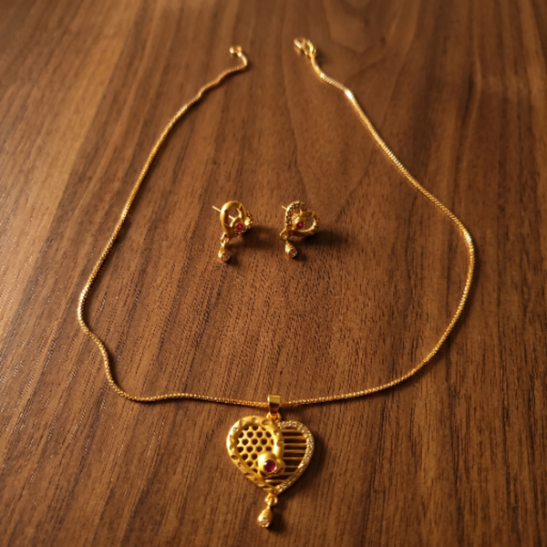 Gold Plated Heart Pendant Necklace with Earrings Set for Women - Ruby Red Stone Studded Traditional Jewellery Set - Adjustable Chain & Heart Drop Earrings for Weddings & Gifting